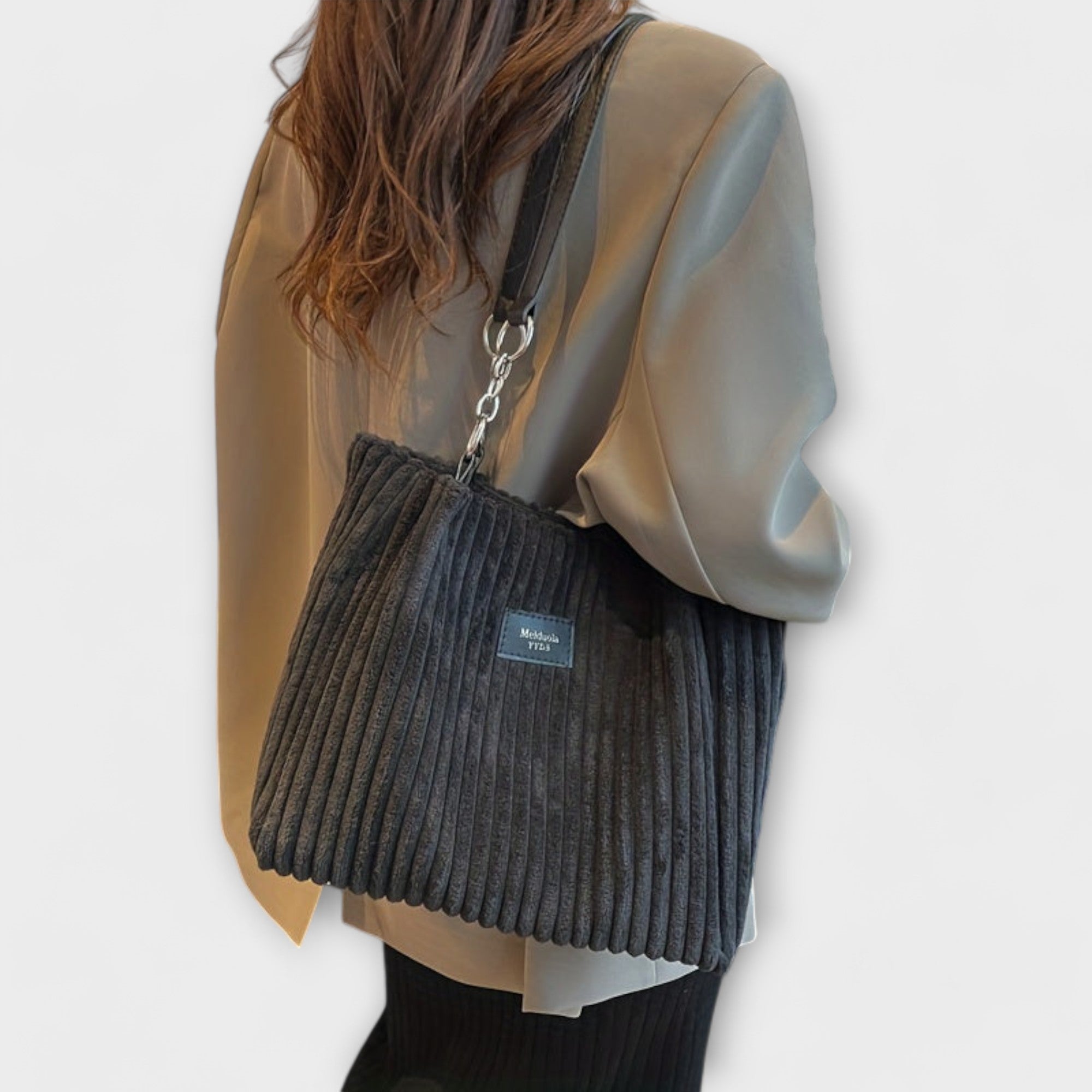 Aurora – Delicada bolsa de hombro de pana con un aire elegante