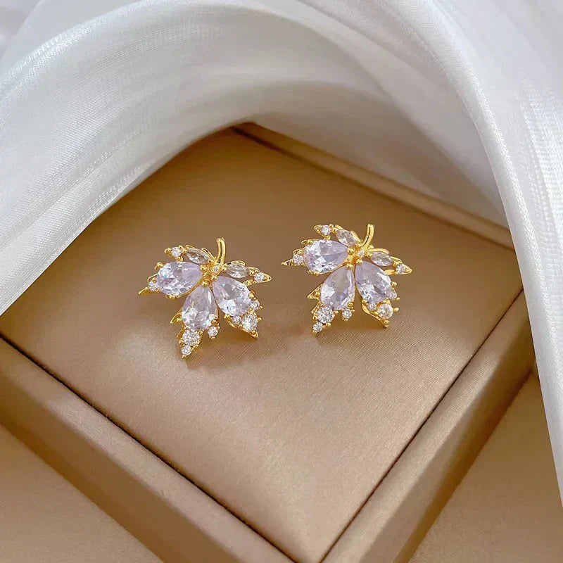 Alba Montiel™ | Pendientes de la suerte con hojas blancas y collar gratis