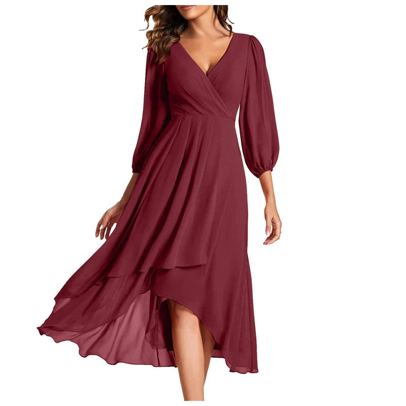 Victorina™ | Vestido elegante con dobladillo asimétrico y mangas fluidas. Un look refinado para cualquier ocasión