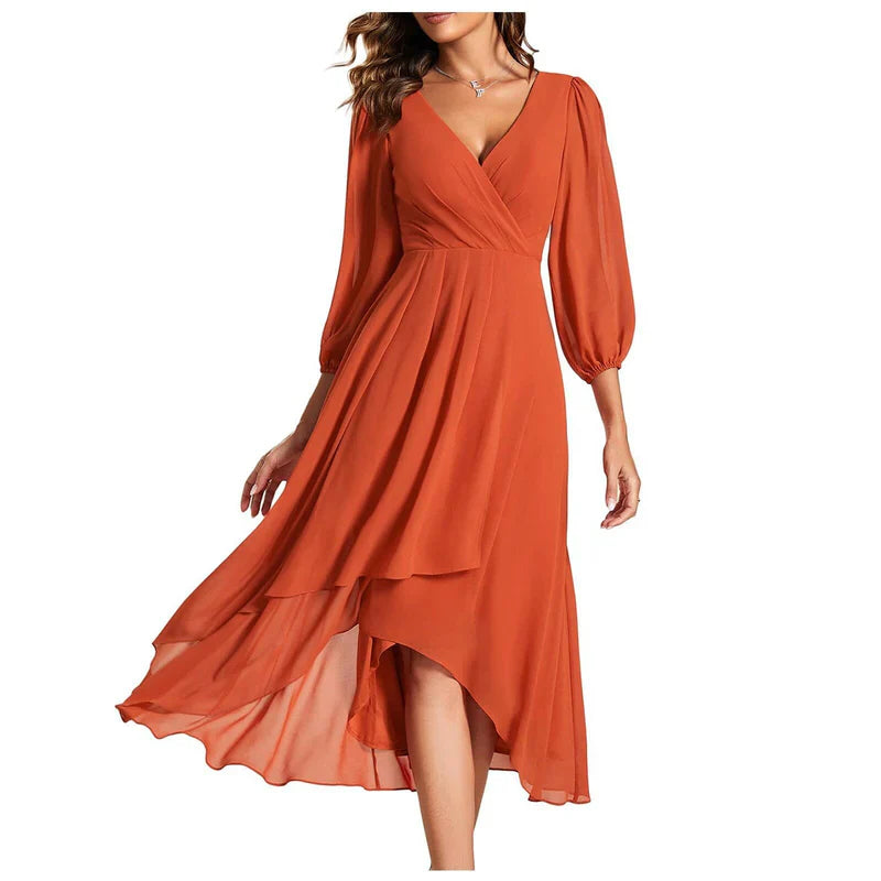 Victorina™ | Vestido elegante con dobladillo asimétrico y mangas fluidas. Un look refinado para cualquier ocasión