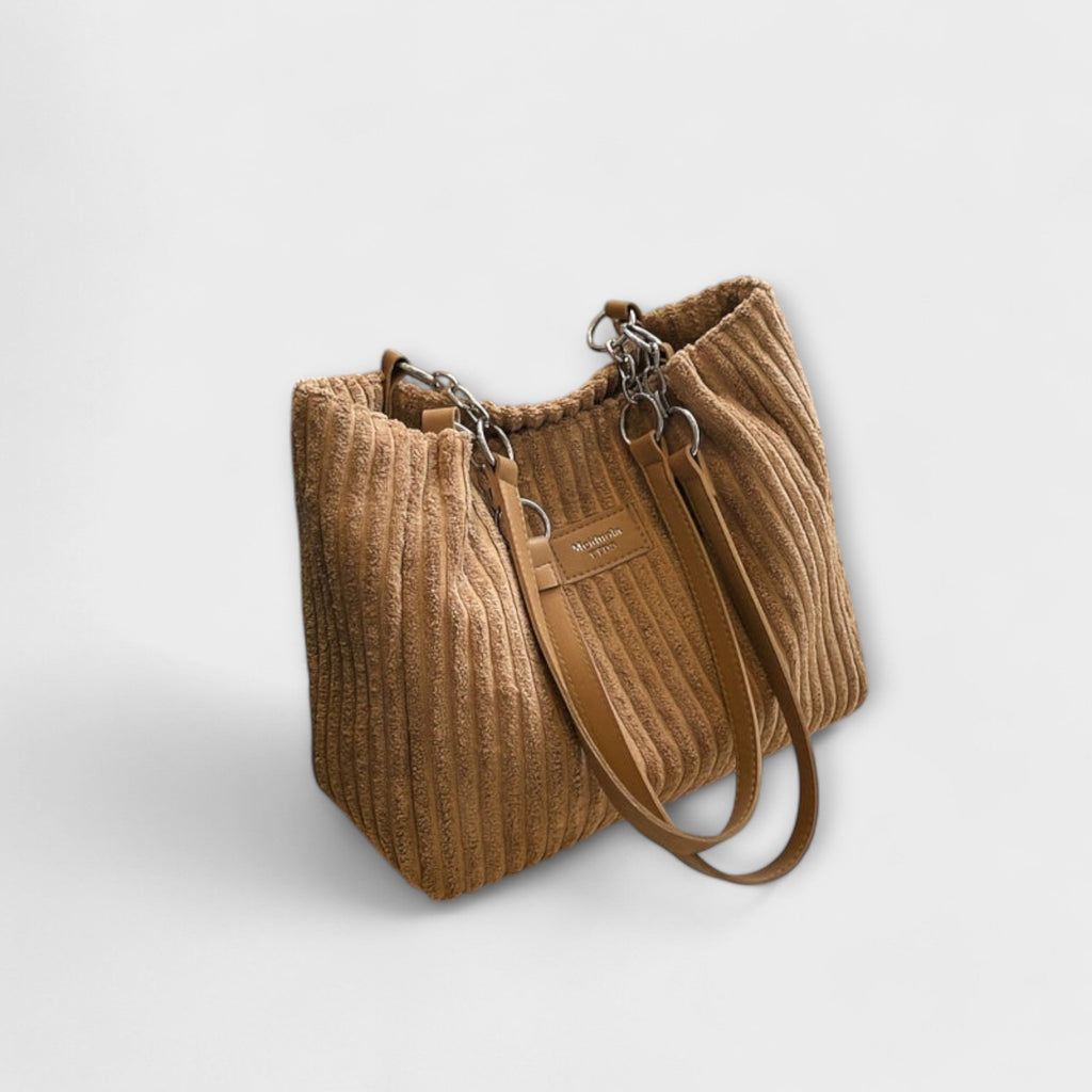 Aurora – Delicada bolsa de hombro de pana con un aire elegante