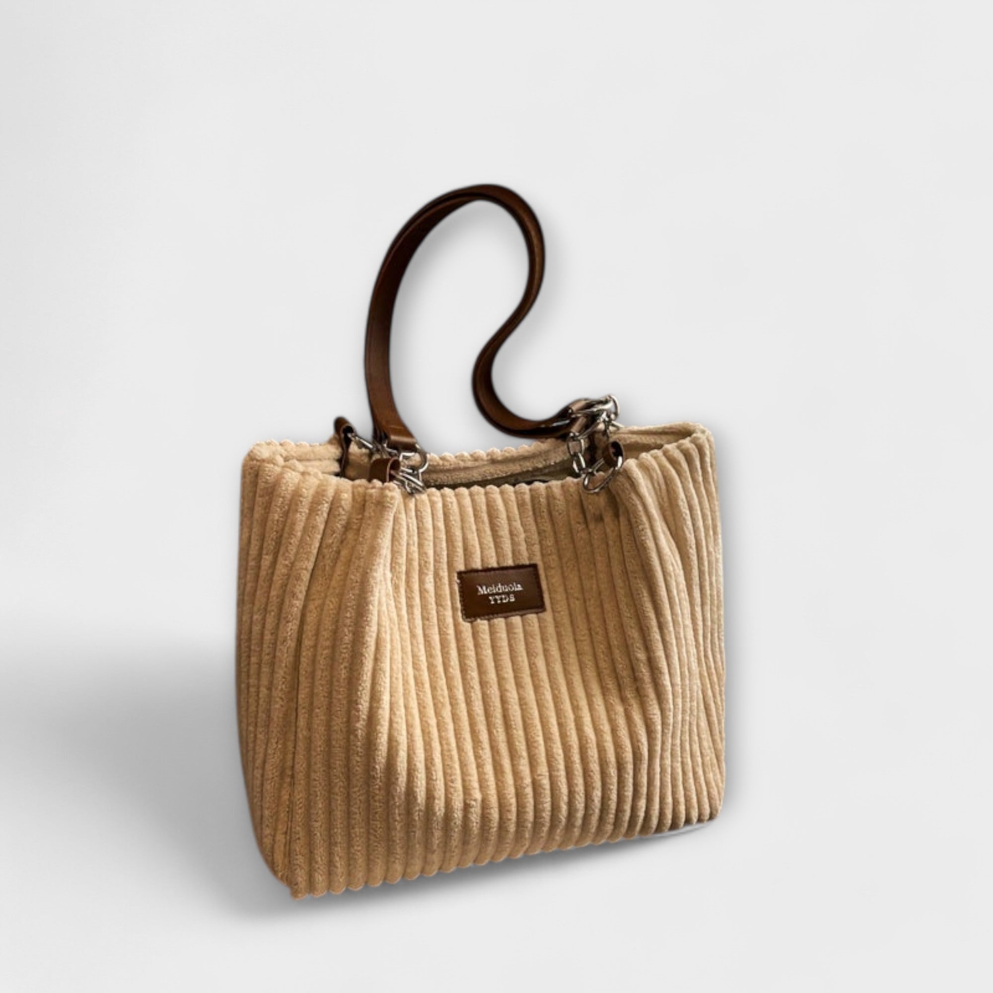 Aurora – Delicada bolsa de hombro de pana con un aire elegante