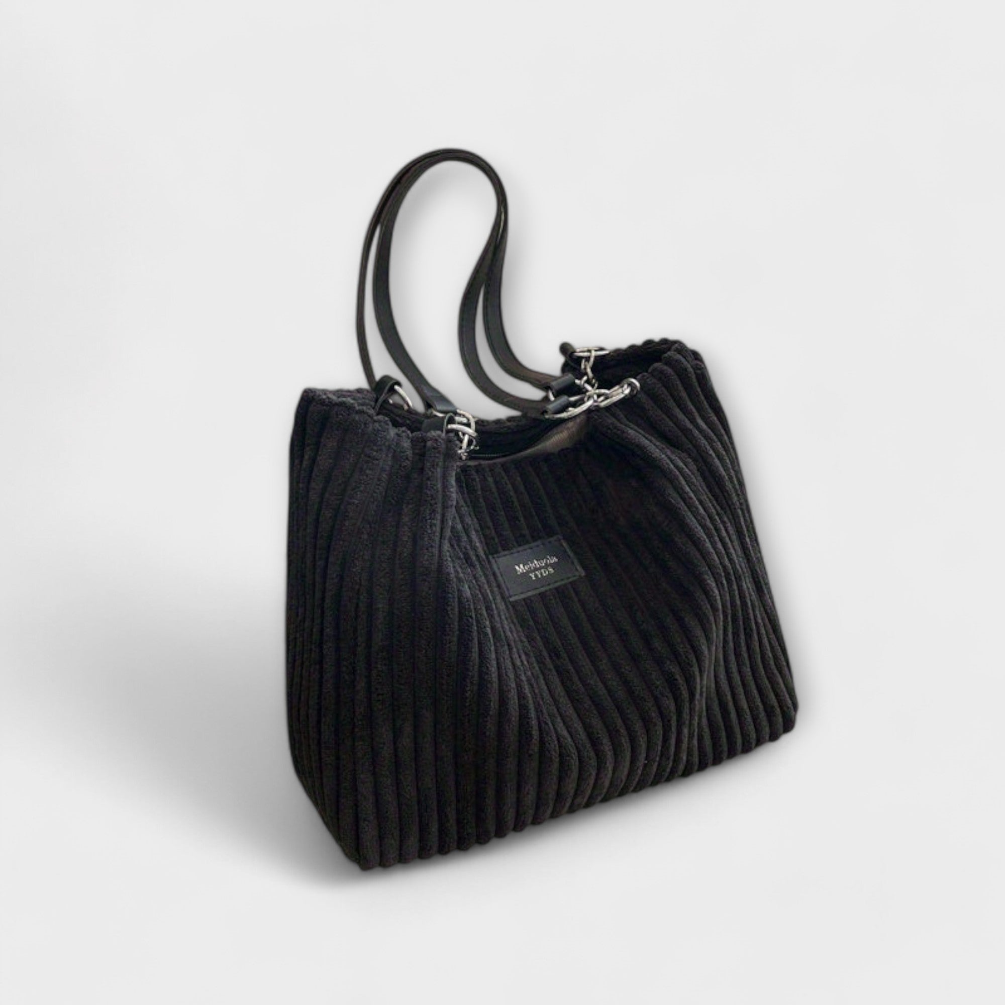 Aurora – Delicada bolsa de hombro de pana con un aire elegante